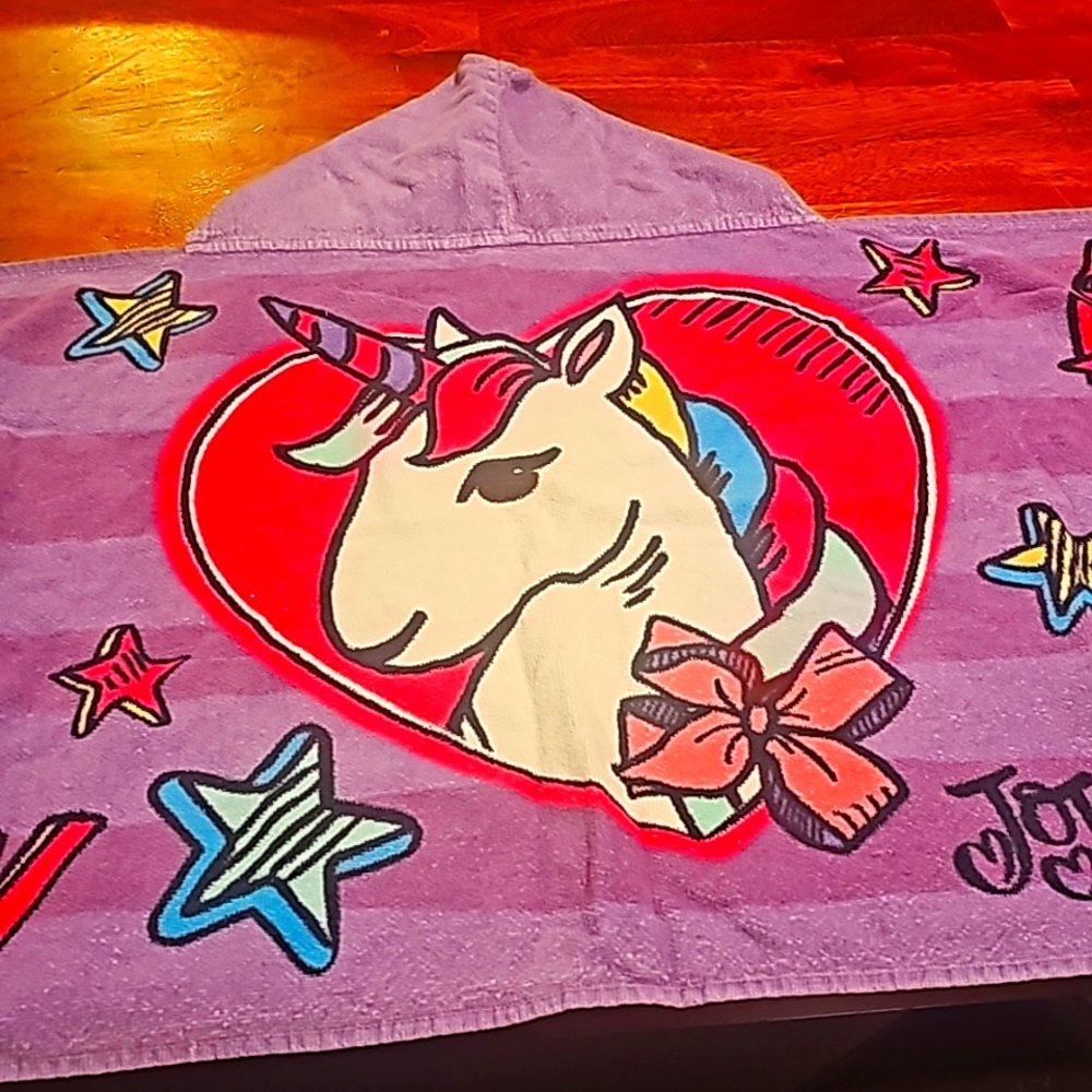 Girls like new super cut jojo siwa hooded bath towel.